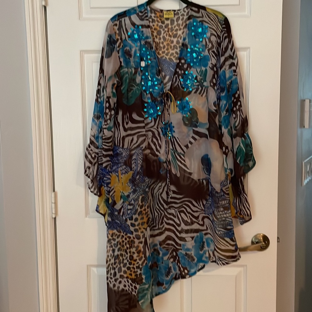 Multi colored beach cover up, size large.